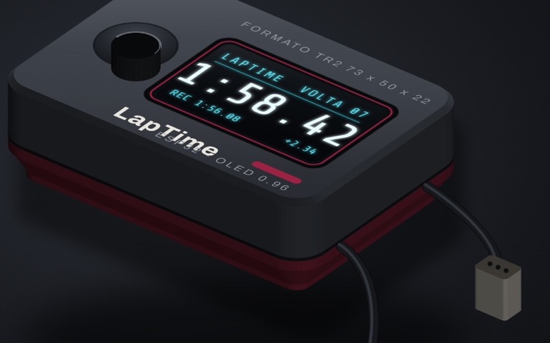 Design render of the LapTime SP-1: a small black body the size of a transponder, showing a lap time on its screen, with two short pigtail connectors